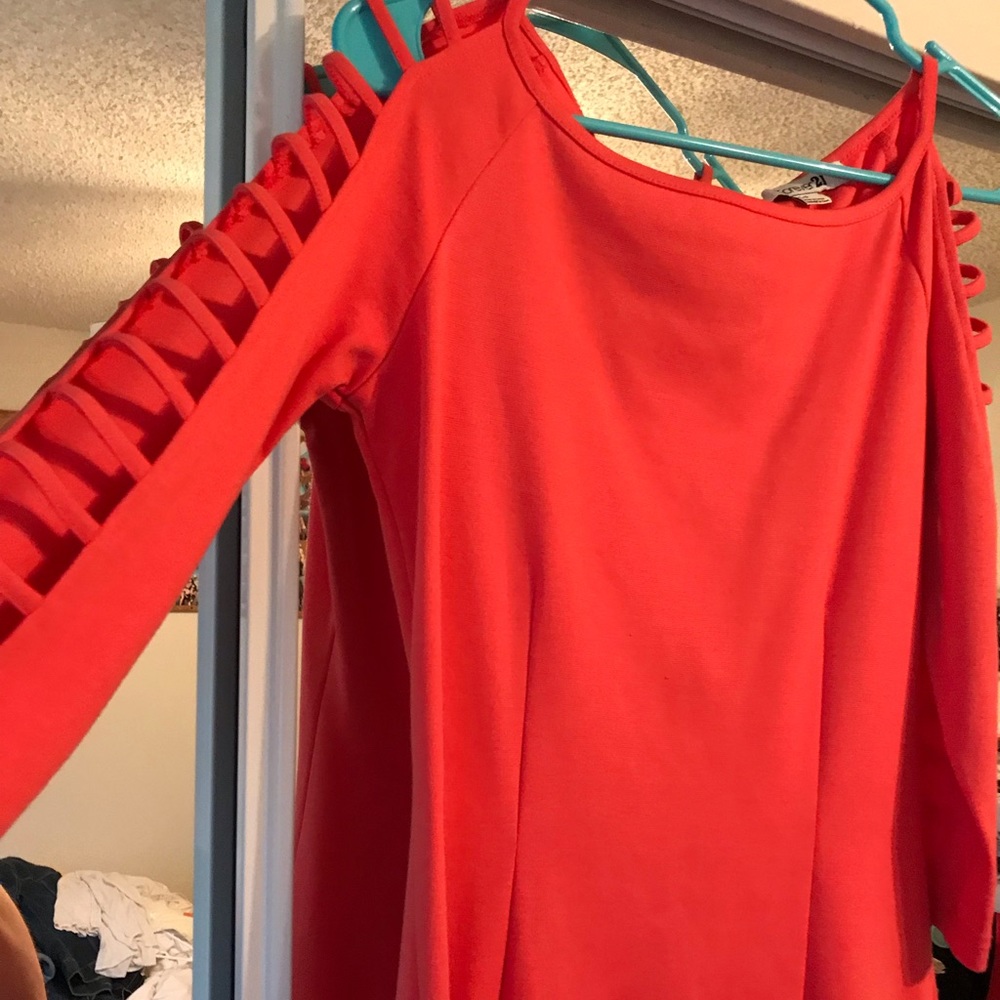 Peach colored tight fitting dress